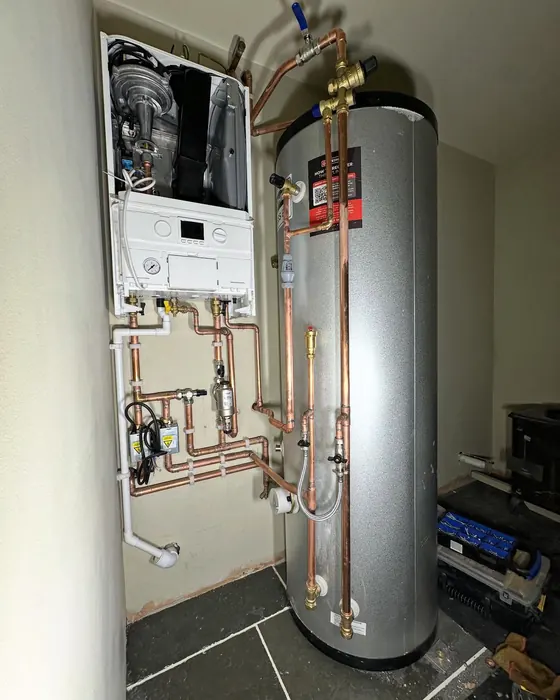 System boiler and unvented cylinder with copper pipework