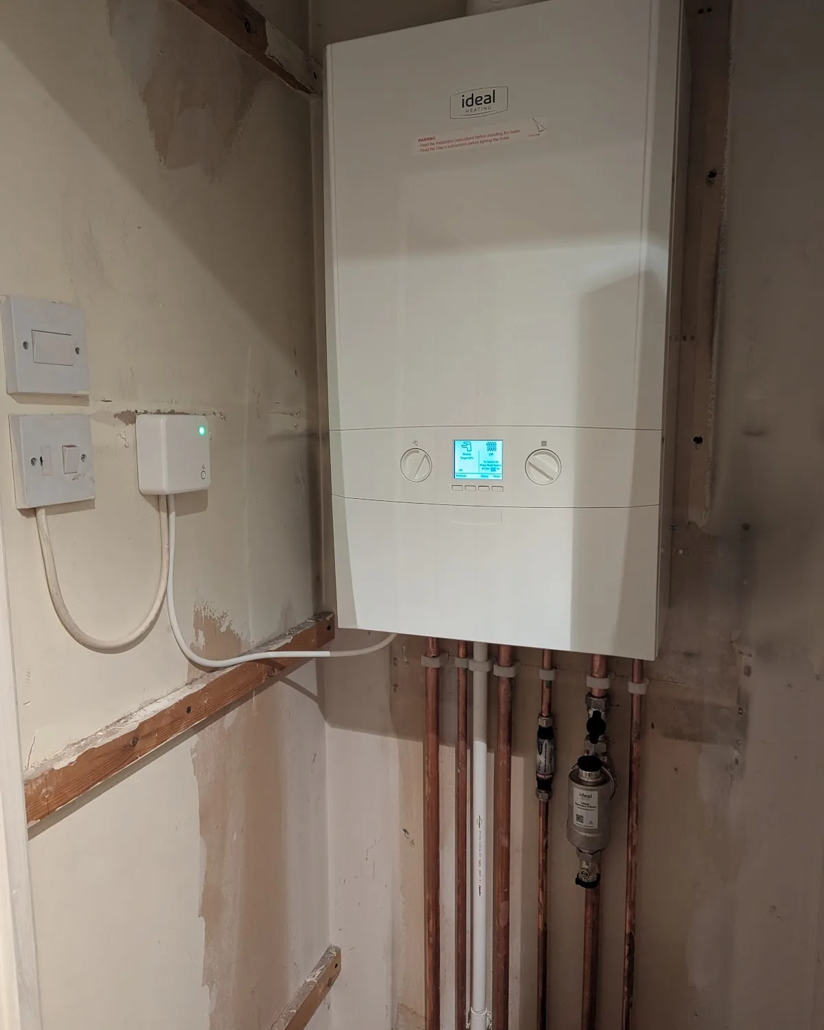 A replacement Ideal combi boiler with new copper pipework, fitted by Addisons
